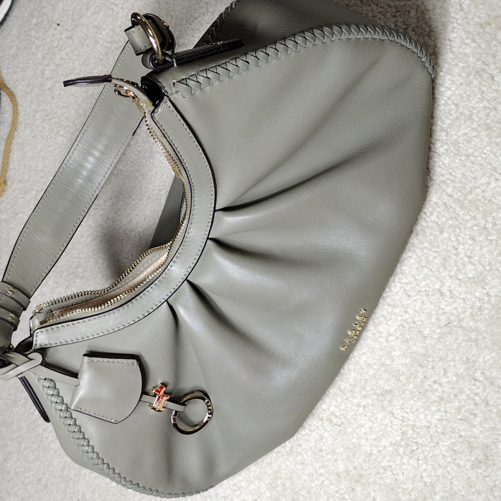 Radley London gray leather shoulder bag with subtle green tones.